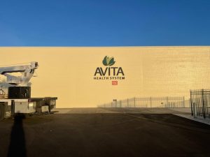 AVITA Health Care Systems Exterior Channel Letter Signage by Adams Signs & Graphics