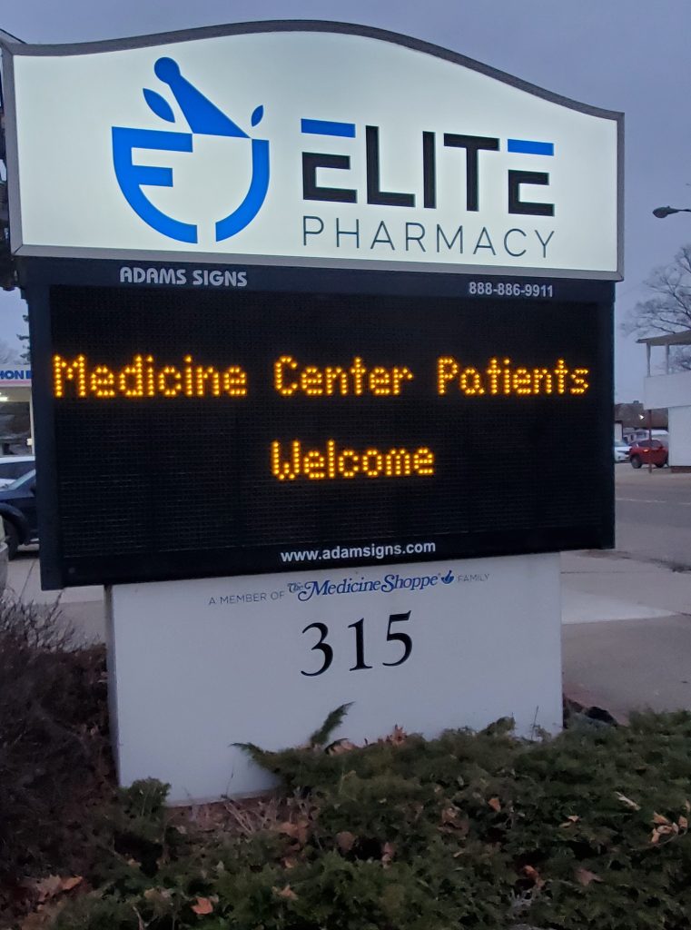 Adams Signs & Graphics LED digital display at elite pharmacy