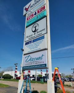 Discount Custom Cabinets illuminated backlit LED retail pylon sign