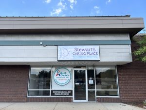 Stewart's Caring Place box sign on the front of the building