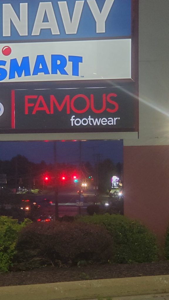 Famous Footwear back-lit panel
