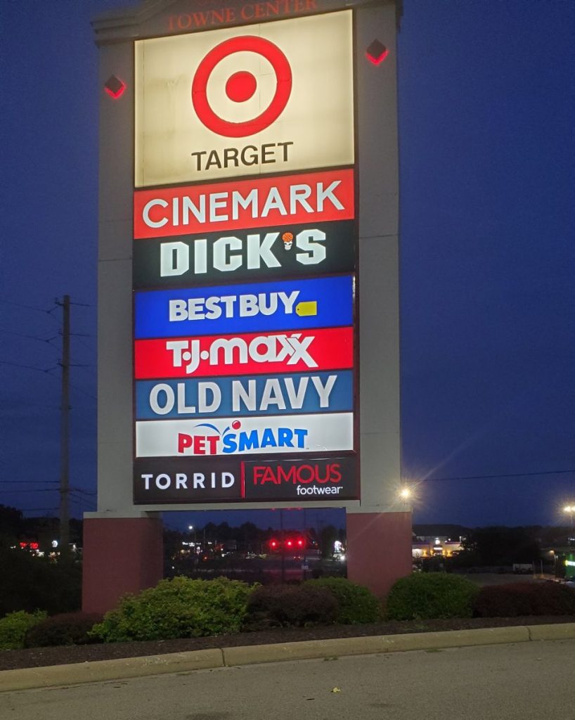 Famous Footwear plaza pole sign