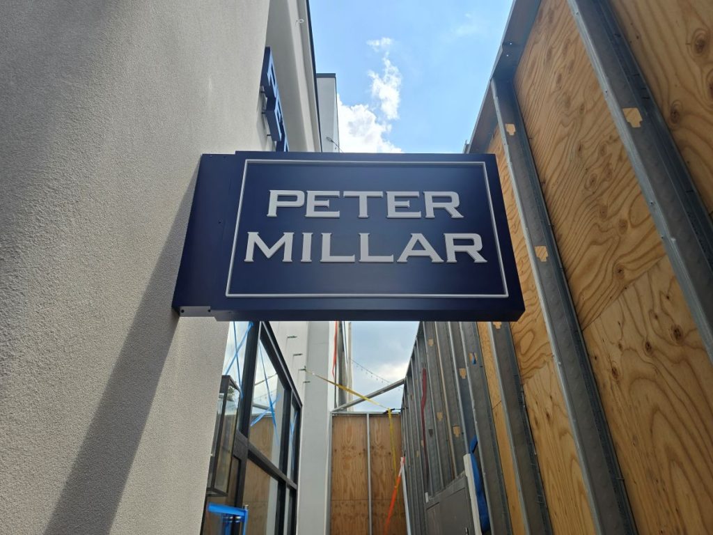 Peter Millar's new outdoor flag mounted sign in the Columbus Easton Mall
