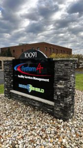 Custom signage solutions for System 4, located in Brecksville, Ohio, engineered and built by Adams Signs. Designed to meet any business's needs.