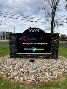 Custom signage for System 4 in Brecksville, Ohio, designed and fabricated by Adams Signs to fit any business’s requirements.