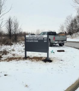 A post sign for Brehmer Leasing by Adams Signs & Graphics