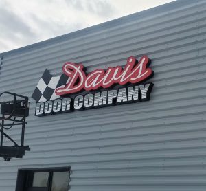 Adam Signs & Graphics manufactures and installed an exterior illuminated wall sign for Davis Door Company, located in Norton, Ohio.