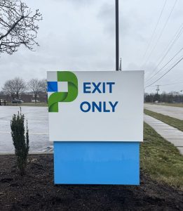 Exit Only aluminum directional sign installed by Adams Signs & Graphics at DoverPhila Credit Union in Dover, Ohio.