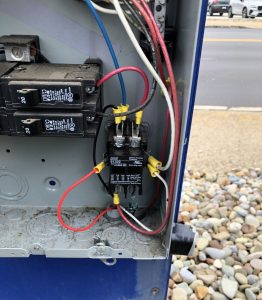 Exterior signage service call from Kempthorn Motors to Adams Signs.