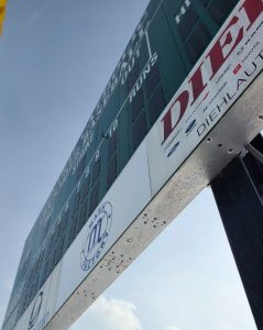 Installed overlay panels on scoreboard at Central Catholic High School by Adams Signs & Graphics in Canton, Ohio.
