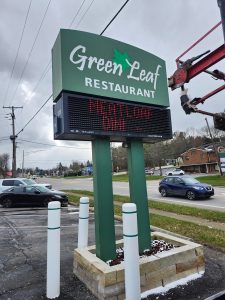 Adams Signs put new LED backlighting in a pylon sign for Green Leaf Restaurant